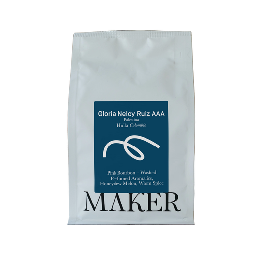A pack of Gloria Neloy Ruiz AAA washed coffee from Colombia, branded with the Maker logo.