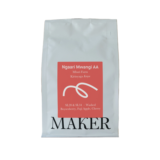 White coffee bag with red label featuring 'Ngaari Mwangi AA' on a beige background